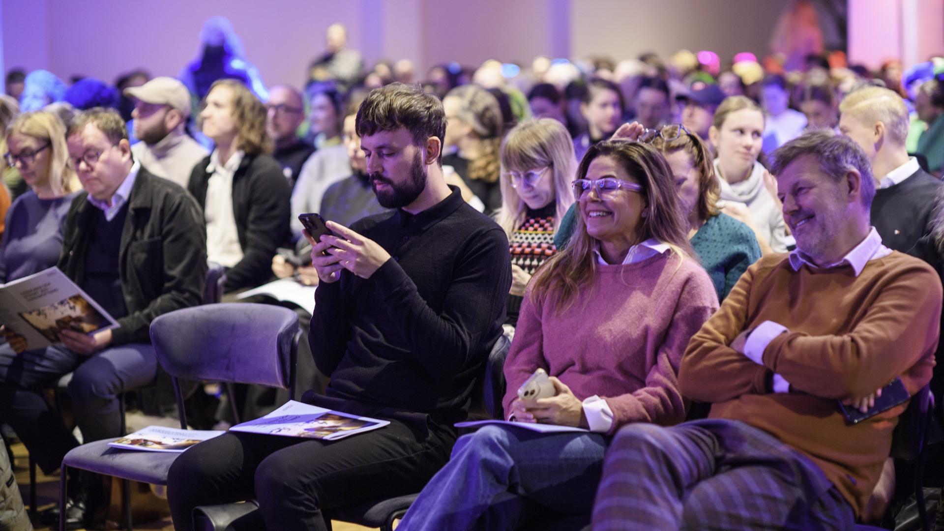 Publik som tittar på ett event.
